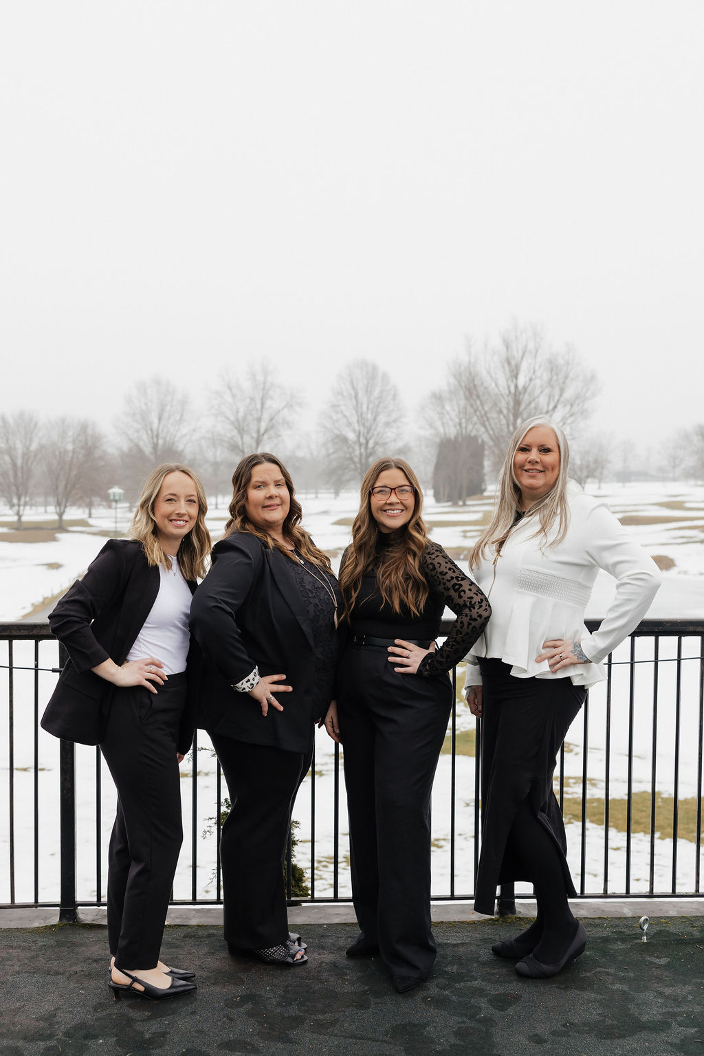 The Chisholm Team on a snowy deck